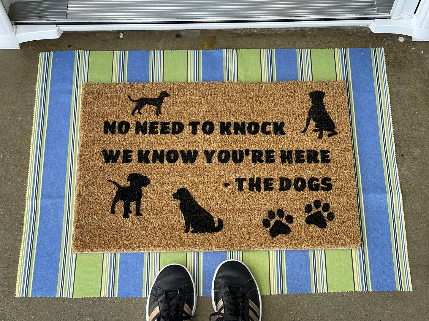 No need to knock, we know you're here. he dogs door mat image 0