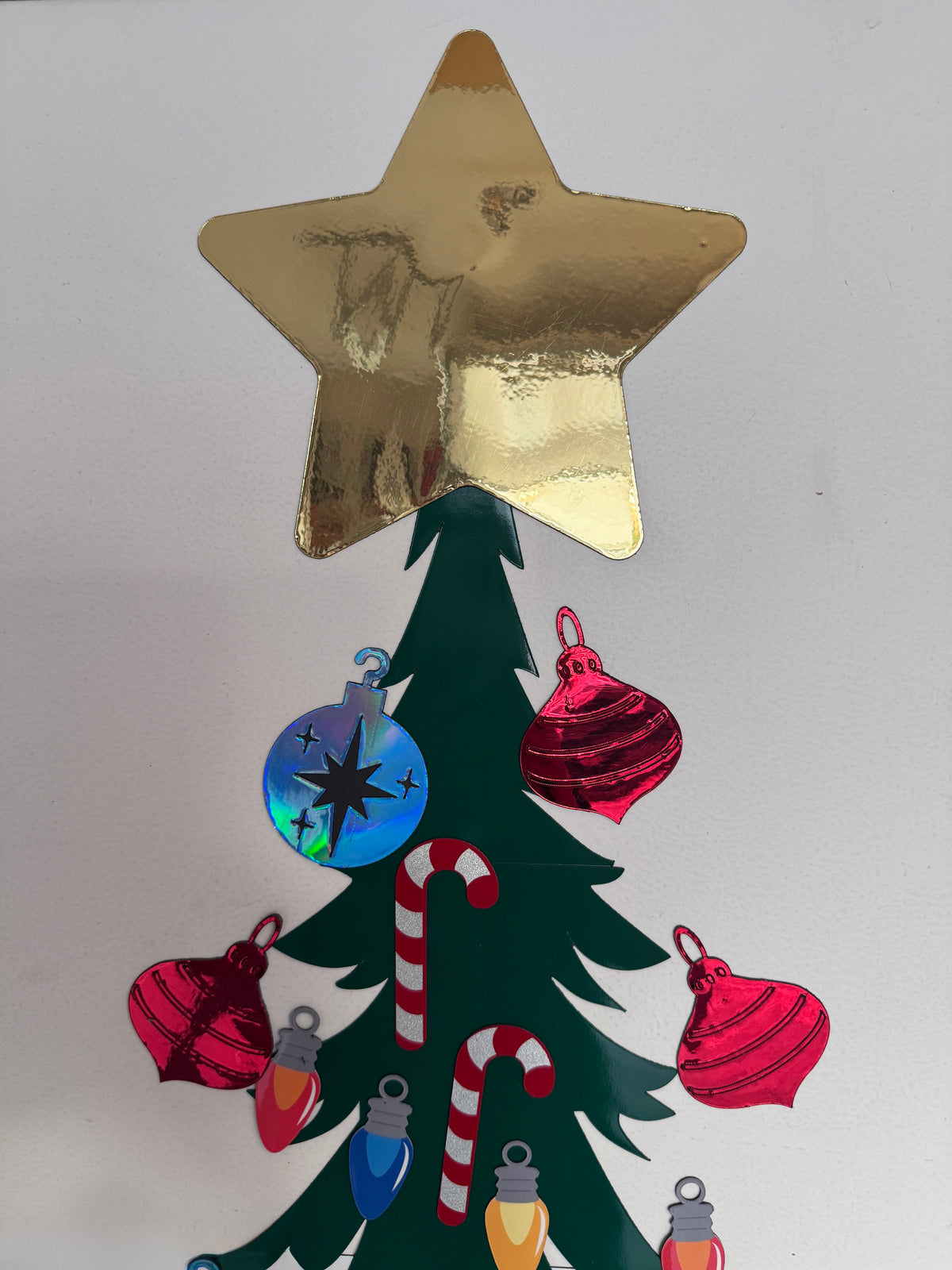 Cruise Ship Cabin door Christmas Tree Decked Out with Ornaments and Candy Canes