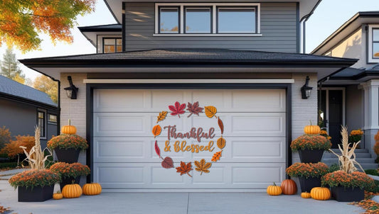 "Thankful & Blessed" fall leaf wreath magnet on a white garage door, with pumpkins and mums in front