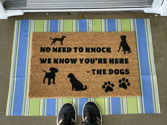 No need to knock, we know you're here. he dogs door mat image 0